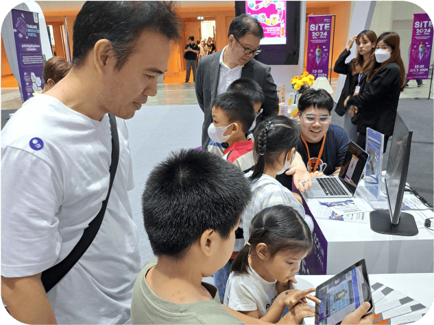Children enjoying interactive coding lessons on tablets